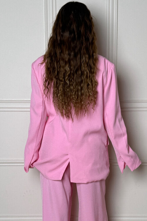 Blazer femme lanières manches fendues style audacieux contemporain
