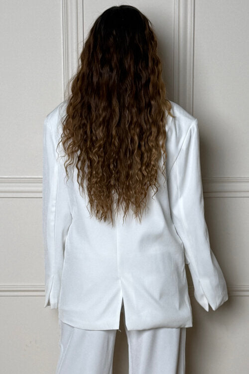 Blazer à lanières femme manches fendues style architectural unique

