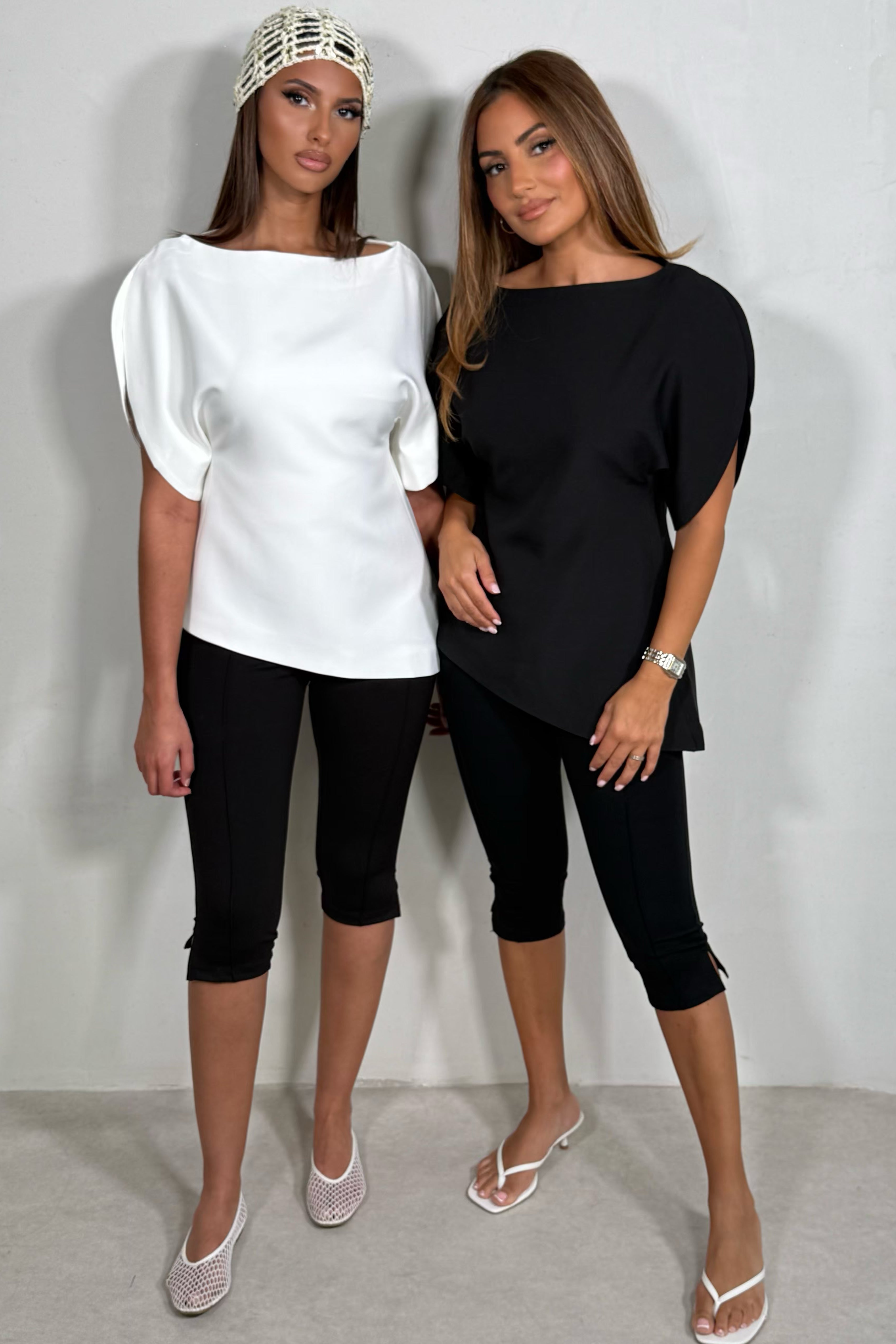 Top Asymétrique Manches Bouffantes – Silhouette Sculptée