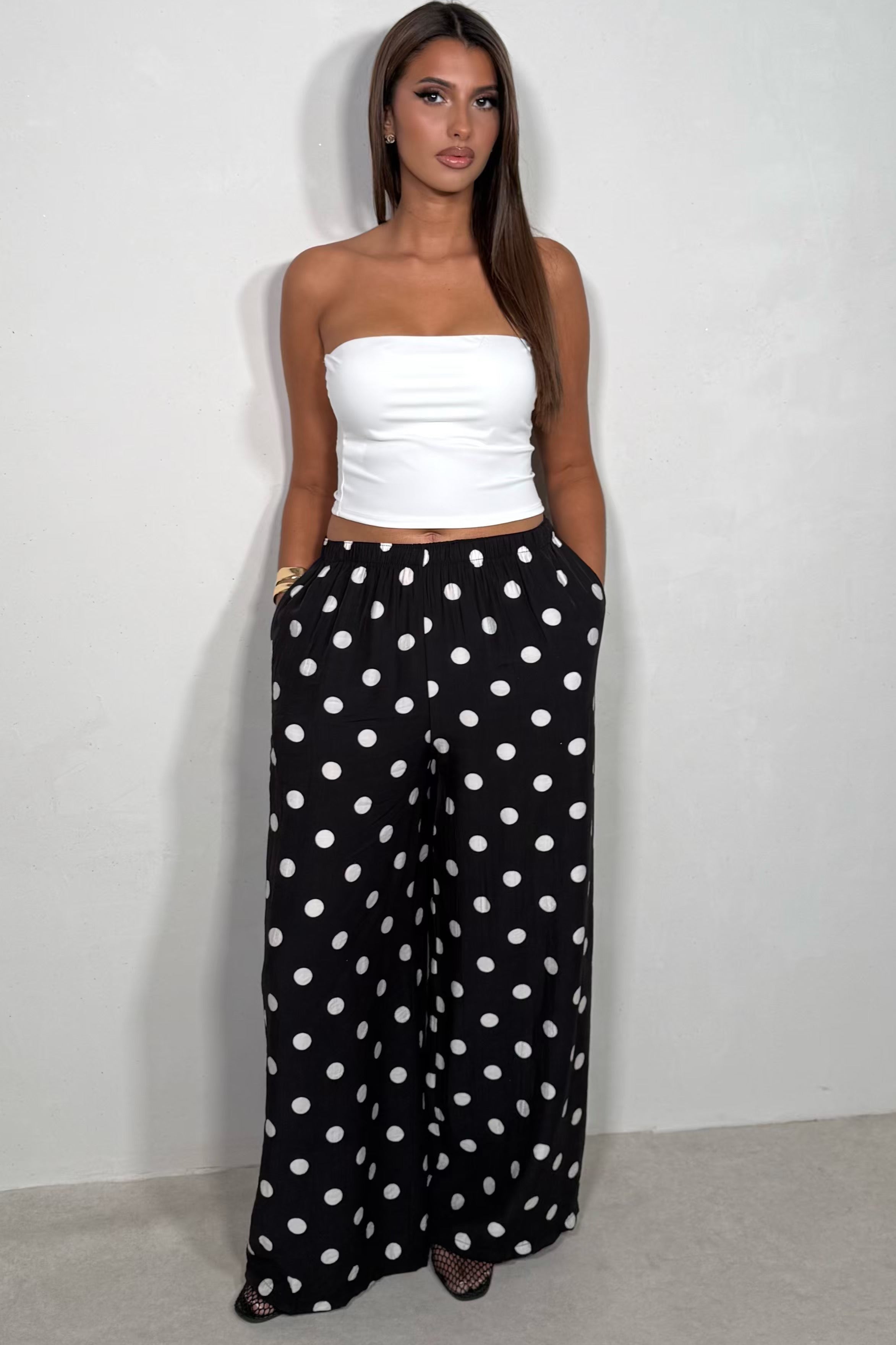 Pantalon large fluide à pois coloris noir taille unique