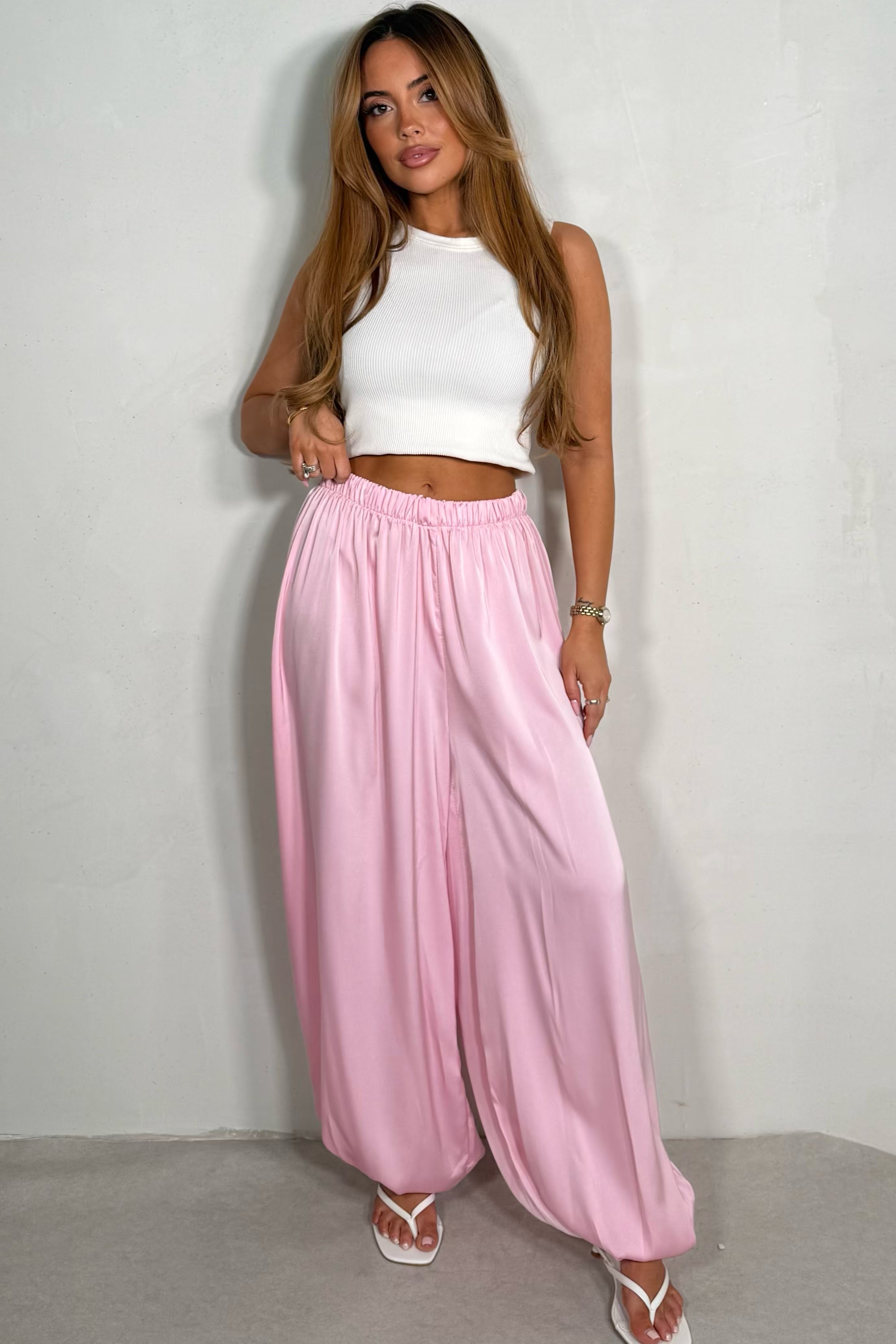 Pantalon satin fluide coupe élégante coloris rose