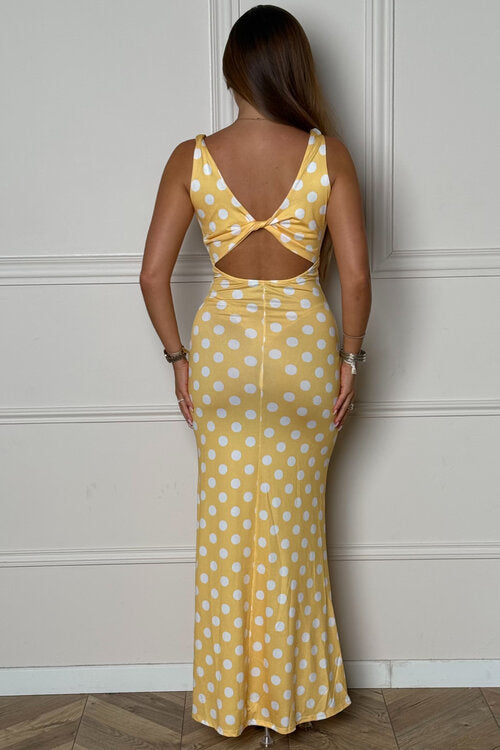 Vue de dos robe vintage à pois
