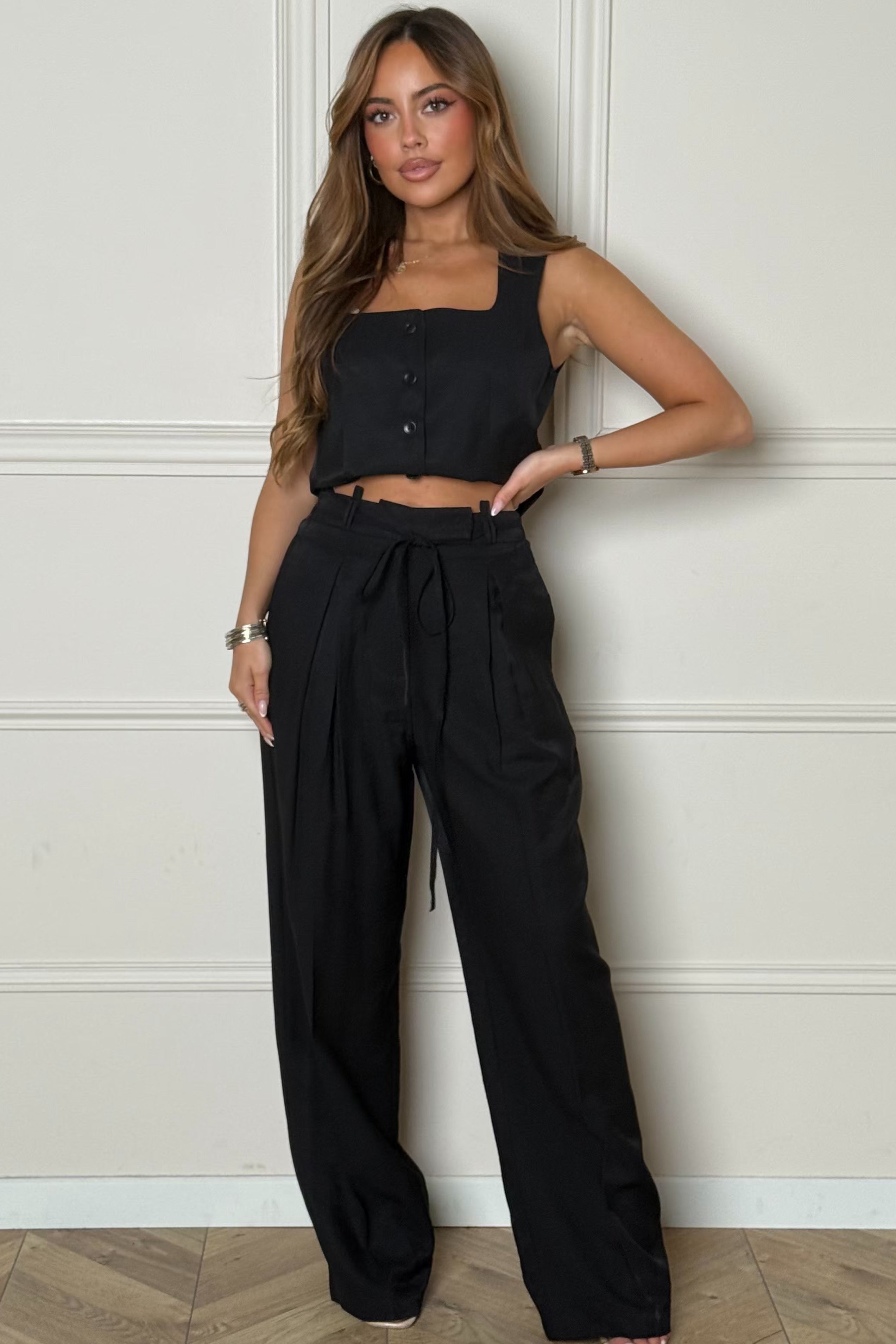 Pantalon femme taille haute à pince avec lanière décorative, coupe chic moderne B